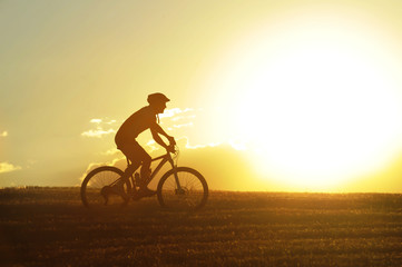 Fototapeta na wymiar profile silhouette sport man riding cross country mountain bike