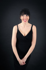Fototapeta premium Beautiful woman doing different expressions in different sets of clothes: smile
