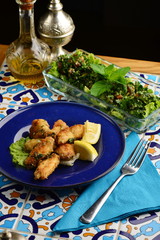 Arabic / Lebanese style chicken wings glazed with a lemon and tabbouleh salad