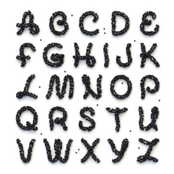 Full alphabet of letters made of black caviar