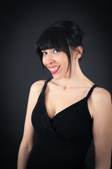 Naklejka premium Beautiful woman doing different expressions in different sets of clothes: smile