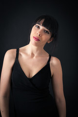 Fototapeta premium Beautiful woman doing different expressions in different sets of clothes: