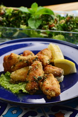 Arabic / Lebanese style chicken wings glazed with a lemon and tabbouleh salad
