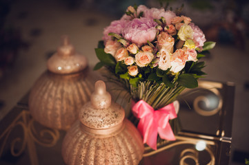 Bouquet of pink peonies  on table