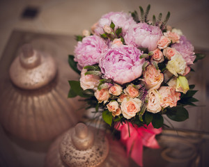 Bouquet of pink peonies  on table