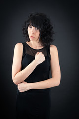 Naklejka premium Beautiful woman doing different expressions in different sets of clothes: innocent