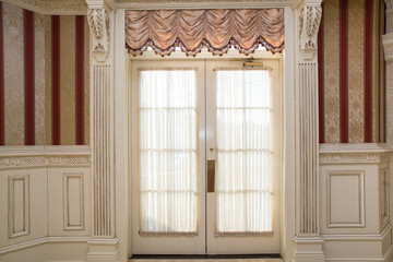 Wall with double french doors in formal setting