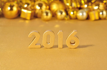 2016 year golden figures and golden Christmas decorations