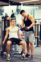 Fototapeta na wymiar man exercising on gym machine