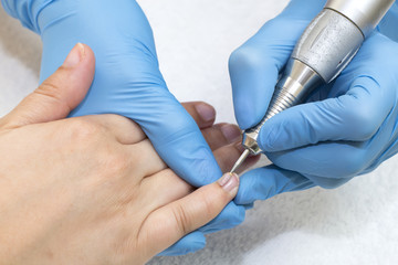 woman doing manicure beauty salon varnish wellness