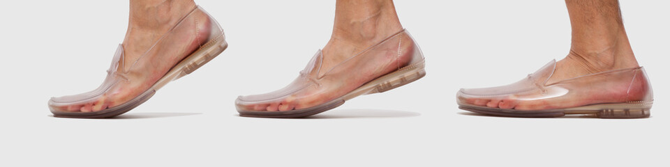 Foot in transparent shoe walking sequence
