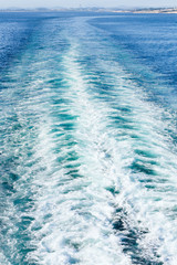 Trace of ferry on sea water.