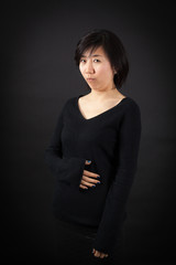 Obraz premium Beautiful woman doing different expressions in different sets of clothes: hungry