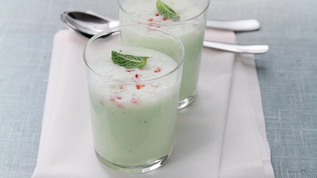 Cold cucumber and yogurt soup in two glasses