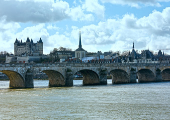 Obraz premium Saumur castle on Loire river (France) spring view.