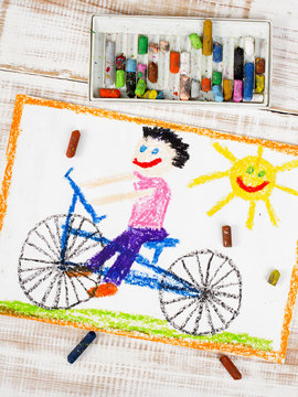 colorful drawing: boy riding bike