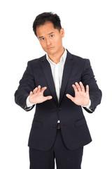 Handsome man doing different expressions in different sets of clothes: stop sign