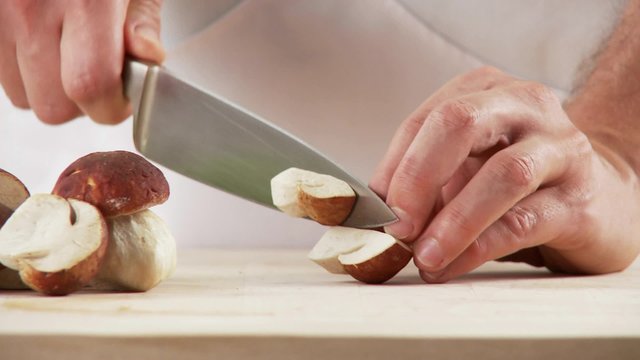 Chopping porcini mushrooms