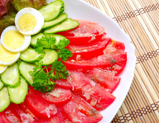 vegetable salad on wooden mat