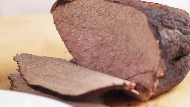 Beef pot roast being sliced