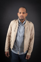 Handsome man doing different expressions in different sets of clothes: hungry