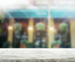 Table Top And Blur Building Background
