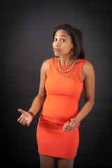Beautiful woman doing different expressions in different sets of clothes: surprise