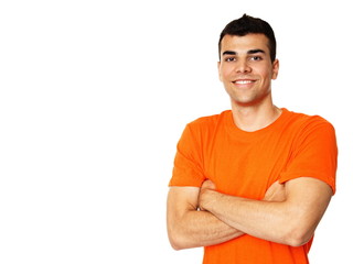 Portrait of young smiling man in orange shirt, left you can write some text