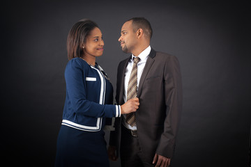 Handsome couple doing different expressions in different sets of clothes: love