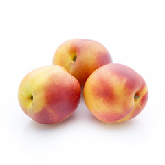 Peach on the white isolatd background.