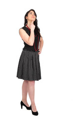 Fototapeta premium Beautiful woman doing different expressions in different sets of clothes: full length