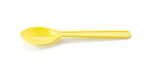 plastic spoon on white background