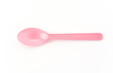 plastic spoon on white background