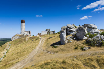 White rocks and ruined medieval castle in Olsztyn, Poland