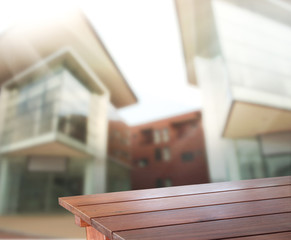 Table Top And Blur Building Background