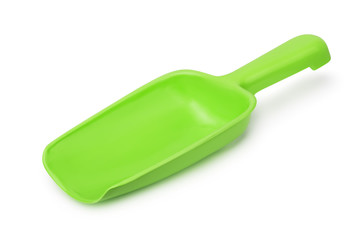Empty green plastic scoop