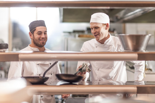 Chefs working in restaurant kitchen