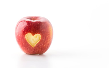 heart shape on red apple