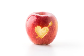 heart shape on red apple
