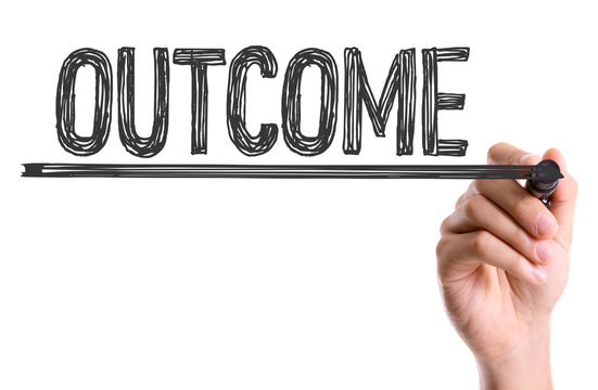 Hand with marker writing the word Outcome