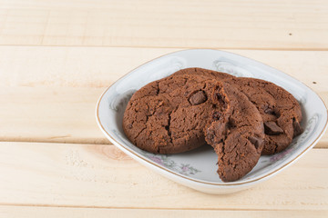 soft dark chocolate brownie cookies on wood