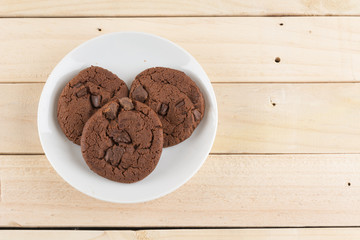 soft dark chocolate brownie cookies on wood