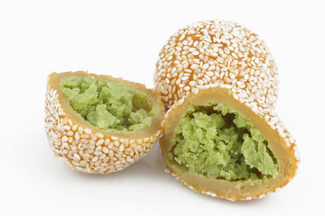 Traditional asian dessert, two sesame balls on the white background