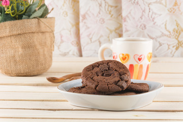 soft dark chocolate brownie cookies on wood
