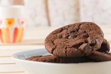 soft dark chocolate brownie cookies on wood