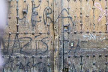 Closed, old wooden door Castilian style in Toledo Spain