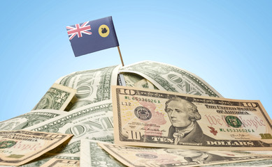 Flag of Western Australia sticking in a pile of american dollars