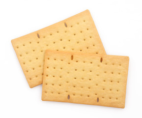 Biscuits or crackers on white background
