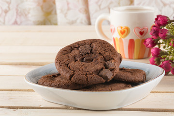 soft dark chocolate brownie cookies on wood