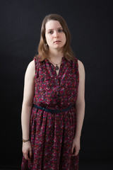 Beautiful woman doing different expressions in different sets of clothes: surprise